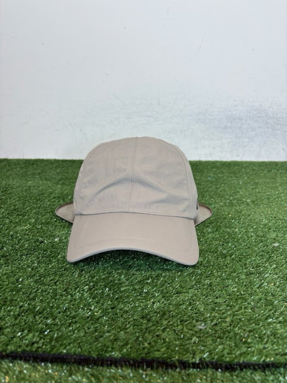 On Running hat cap strap back cinder tan lighweight moisture wicking running men